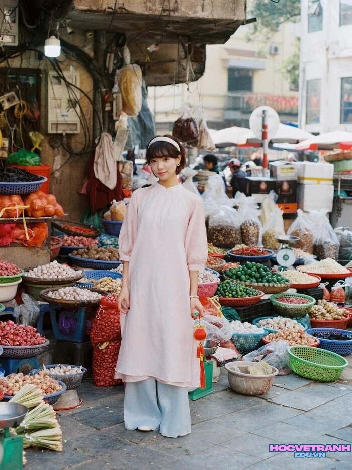 gái xinh mặc áo dài chụp ảnh ngoài trời